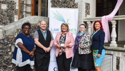 Foluke Adebisi, Professor of Law at the University of Bristol Law School and Finalist Law Teacher of the Year 2024 standing together with fellow award finalists at the Celebrating Excellence in Law Teaching conference, June 2024.